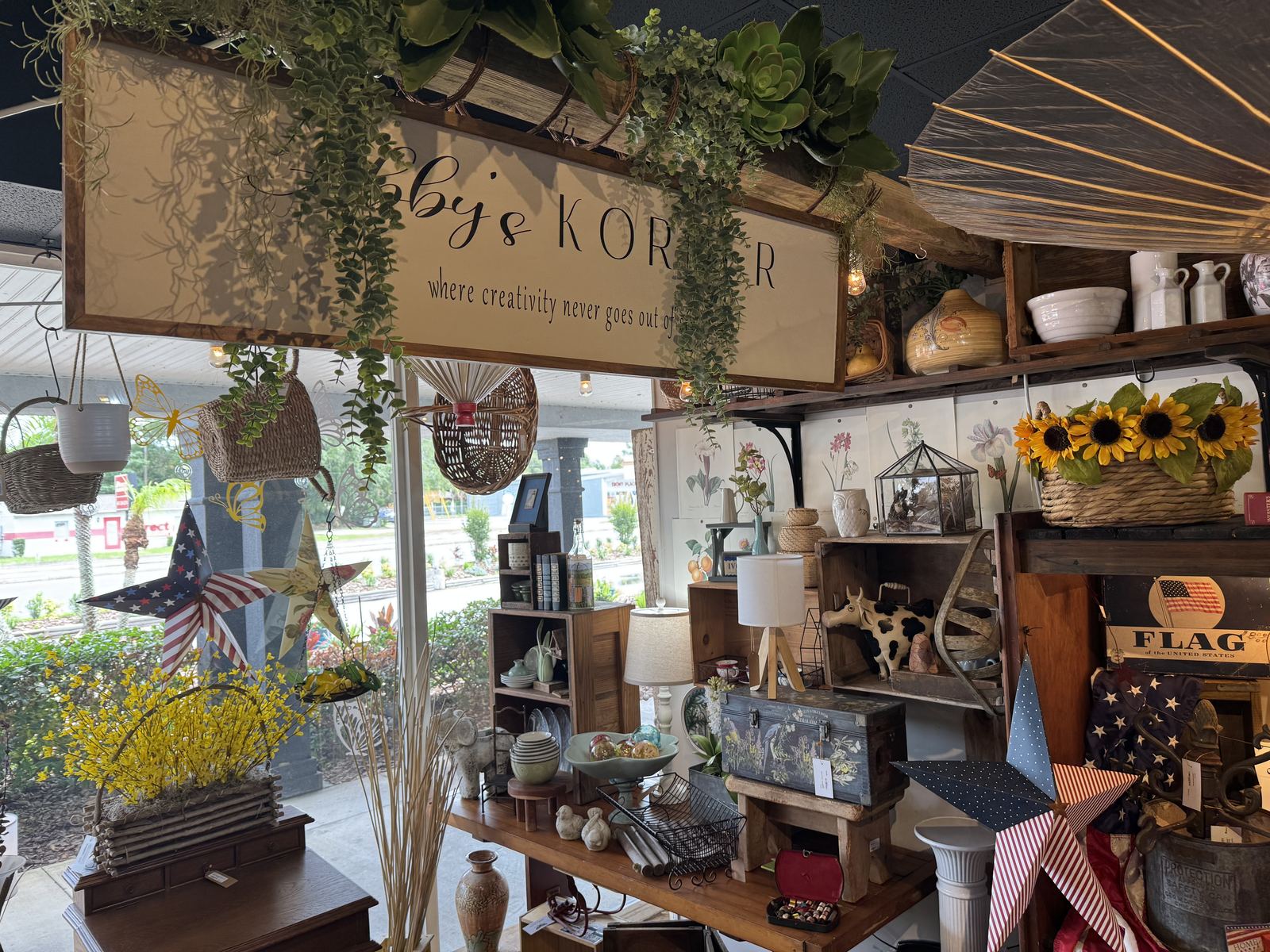 Abby's Korner booth at The Mercantile, under the hand-lettered sign